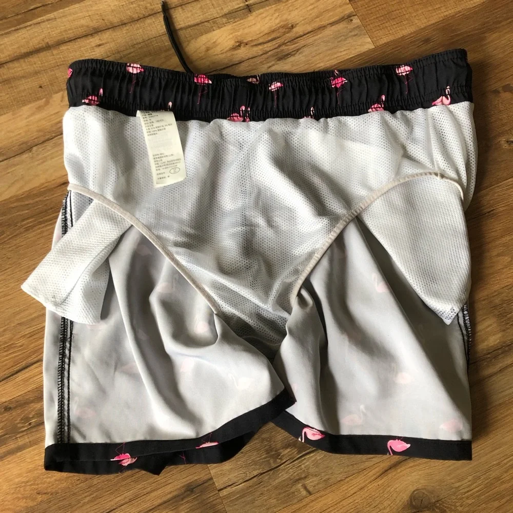 Men’s Black w/ pink Flamingos swim trunks  Hollister  Size Medium